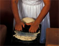 Woman making tortillas